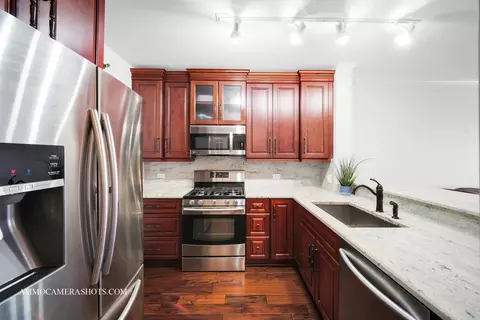 Kitchen - 111 N Wheaton Ave #308, Wheaton, IL 60187 photo 2 of 5