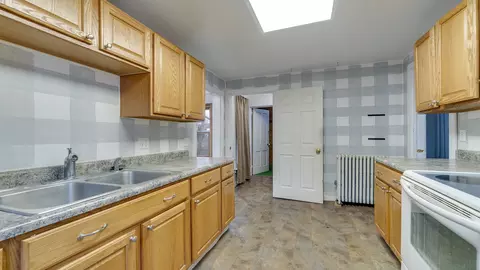 Kitchen - 401 Main St, Leaf River, IL 61047 photo 2 of 2