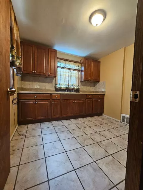 Kitchen - 1253 E 95th Pl, Chicago, IL 60628 photo 1 of 1