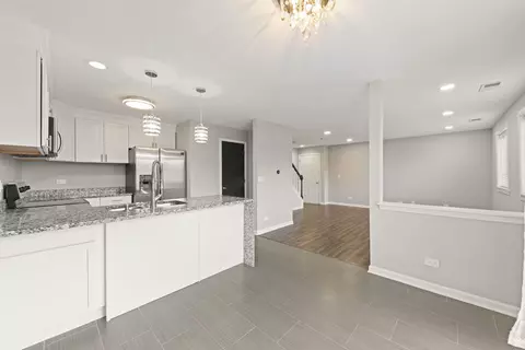 Living - 1344 S Lorraine Rd #E, Wheaton, IL 60189 photo 1 of 3