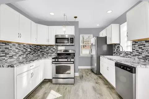 Kitchen - 10029 S Crandon Ave, Chicago, IL 60617 photo 3 of 4