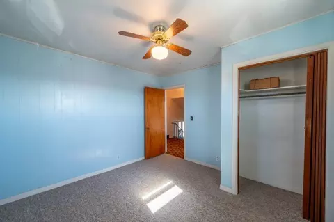Bedroom - 505 E 3rd St, Leaf River, IL 61047 photo 2 of 2