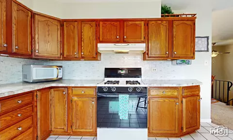 Kitchen - 5941 Stuart Ln, Oak Forest, IL 60452 photo 2 of 2