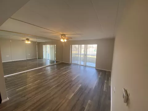 Living - 127 N Wolf Rd #56A, Wheeling, IL 60090 photo 1 of 1