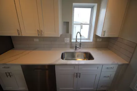 Kitchen - 300 E 142nd St, Dolton, IL 60419 photo 3 of 5