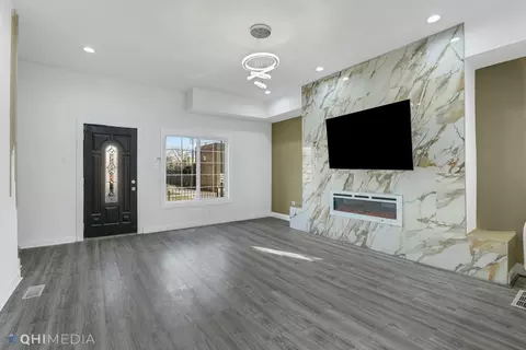 Living - 739 E 91st Pl, Chicago, IL 60619 photo 2 of 2