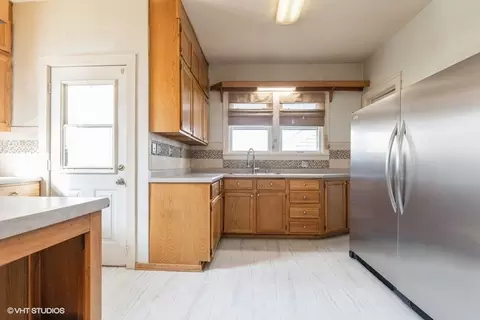 Kitchen - 22 N Commonwealth Ave, Elgin, IL 60123 photo 2 of 2