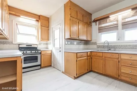 Kitchen - 22 N Commonwealth Ave, Elgin, IL 60123 photo 1 of 2
