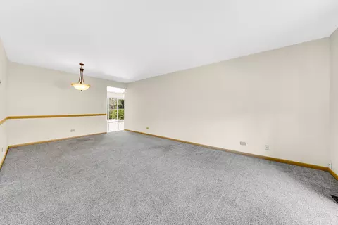 Living - 810 W Pine Ave, Roselle, IL 60172 photo 2 of 4