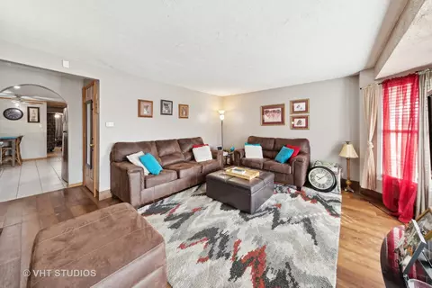 Living - 208 E 87th St, Chicago, IL 60619 photo 2 of 2