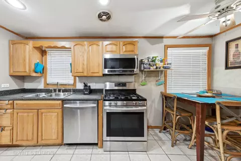 Kitchen - 208 E 87th St, Chicago, IL 60619 photo 1 of 2