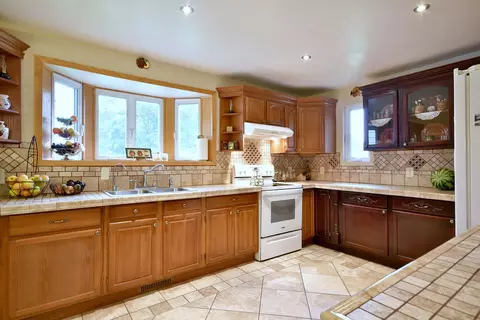 Kitchen - 16989 E Ritchie Rd, Rochelle, IL 61068 photo 2 of 4