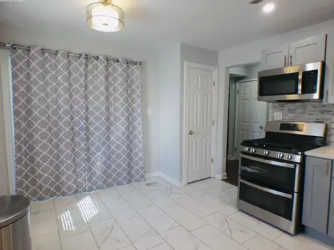 Kitchen - 9930 S Clyde Ave, Chicago, IL 60617 photo 3 of 5