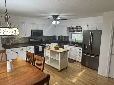 Kitchen - 210 N Pine St, Maroa, IL 61756 photo 3 of 4