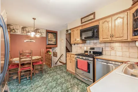 Kitchen - 22906 State St, Steger, IL 60475 photo 2 of 2