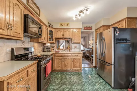 Kitchen - 22906 State St, Steger, IL 60475 photo 1 of 2