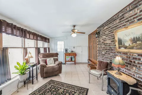 Living - 22906 State St, Steger, IL 60475 photo 4 of 4