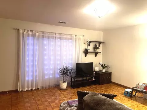 Living - 9714 Bianco Ter #E, Des Plaines, IL 60016 photo 3 of 3