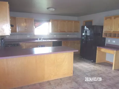 Kitchen - 1306 E Heather Rd, Bourbonnais, IL 60914 photo 2 of 2