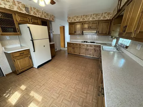 Kitchen - 6941 Pershing Rd, Stickney, IL 60402 photo 2 of 2