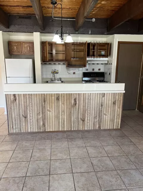 Kitchen - 702 Kenneth Cir, Elgin, IL 60120 photo 2 of 3