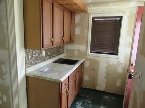 Kitchen - 402 Sutherland Ave, Paris, IL 61944 photo 2 of 3
