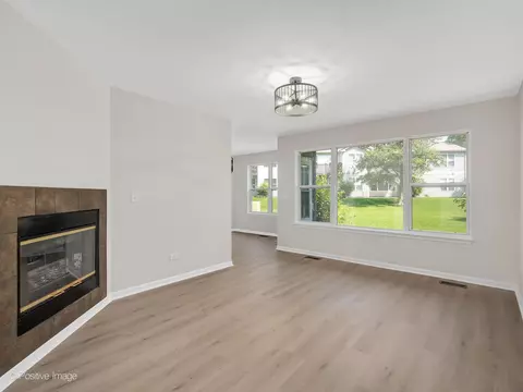 Living - 1106 Yorkshire Ct #B, Elgin, IL 60120 photo 2 of 2