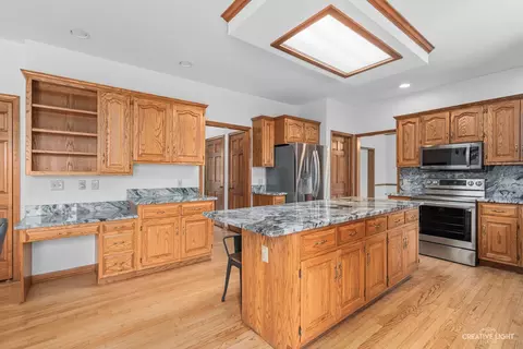 Kitchen - 980 Eldamain Rd, Plano, IL 60545 photo 2 of 3