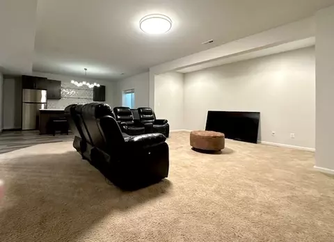 Living - 4801 Sandcherry Dr, Champaign, IL 61822 photo 4 of 5
