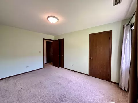 Bedroom - 241 Stanhope Dr #C, Willowbrook, IL 60527 photo 3 of 5