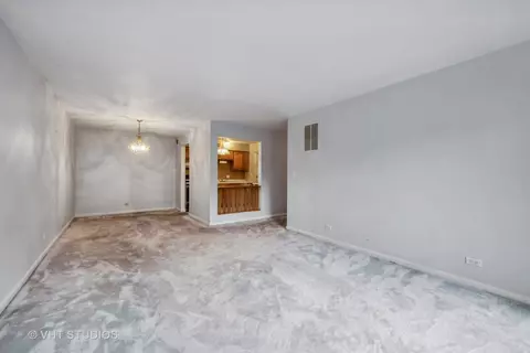 Living - 5300 Carriageway Dr #112, Rolling Meadows, IL 60008 photo 1 of 1