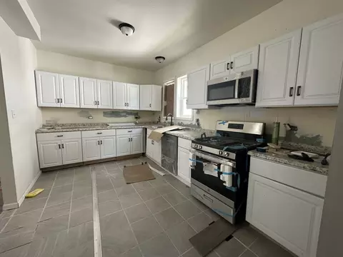 Kitchen - 5 N State St, Aurora, IL 60505 photo 2 of 2