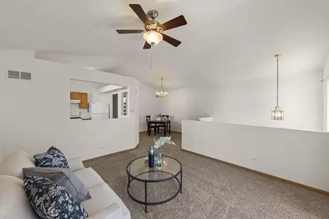 Living - 897 Symphony Dr, Aurora, IL 60504 photo 2 of 4
