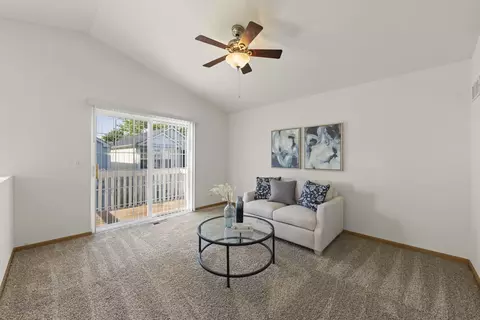 Living - 897 Symphony Dr, Aurora, IL 60504 photo 1 of 4