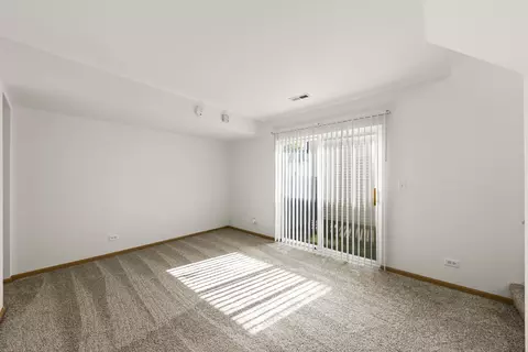 Living - 897 Symphony Dr, Aurora, IL 60504 photo 3 of 4