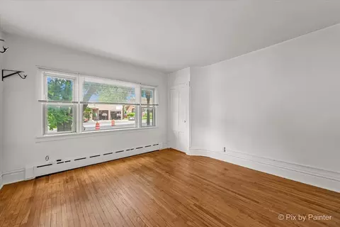 Living - 439 S State St, Elgin, IL 60123 photo 3 of 4