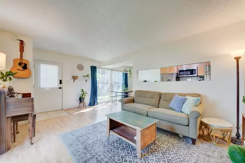 Living - 1664 Valley Forge Ct #D, Wheaton, IL 60189 photo 1 of 3
