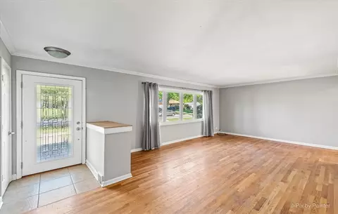 Living - 1304 E Illinois St, Wheaton, IL 60187 photo 1 of 7