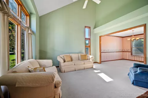 Living - 445 Windsor Dr, Oswego, IL 60543 photo 1 of 4