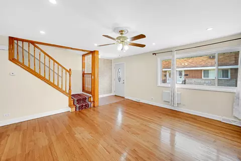 Living - 8666 Gregory Ln #E, Des Plaines, IL 60016 photo 3 of 3