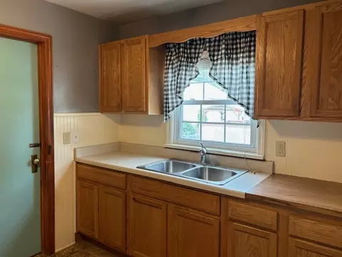 Kitchen - 704 Woolf Ct, Rochelle, IL 61068 photo 2 of 3