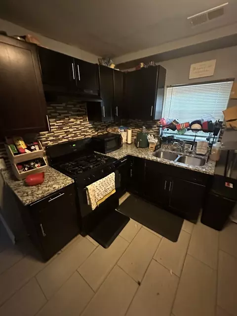 Kitchen - 1061 E 80th St, Chicago, IL 60619 photo 1 of 3