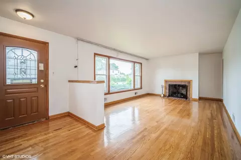 Living - 1045 E Thacker St, Des Plaines, IL 60016 photo 1 of 7