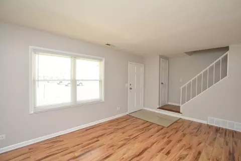 Living - 1663 Mckool Ave, Streamwood, IL 60107 photo 2 of 3