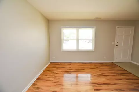 Living - 1663 Mckool Ave, Streamwood, IL 60107 photo 1 of 3