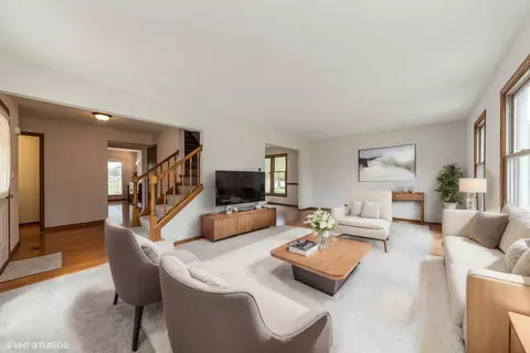 Living - 4340 Forest Glen Dr, Hoffman Estates, IL 60192 photo 1 of 2