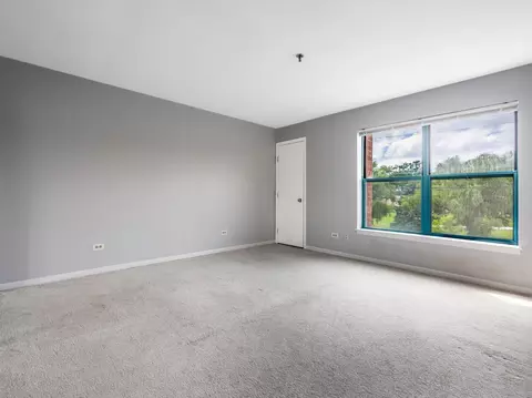 Living - 3265 Kirchoff Rd #228, Rolling Meadows, IL 60008 photo 4 of 5