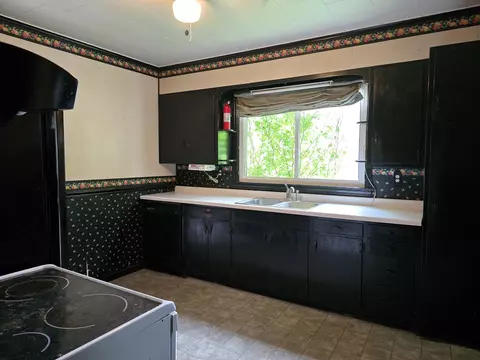Kitchen - 646 E Locust St, Lanark, IL 61046 photo 3 of 3