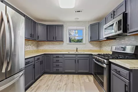 Kitchen - 22710 State St, Steger, IL 60475 photo 2 of 3