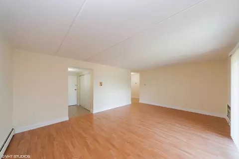 Living - 563 Fairway View Dr #2F, Wheeling, IL 60090 photo 1 of 4